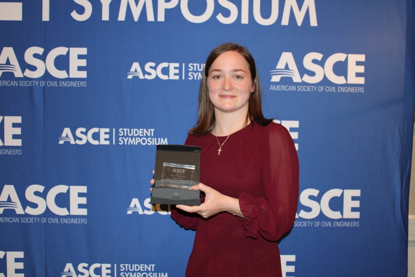 Wells receiving award