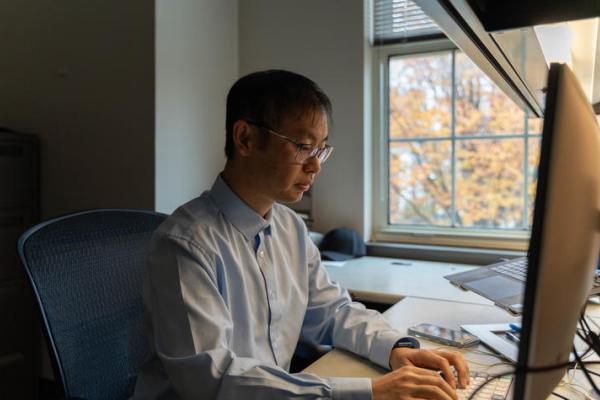Xiao on computer in office 