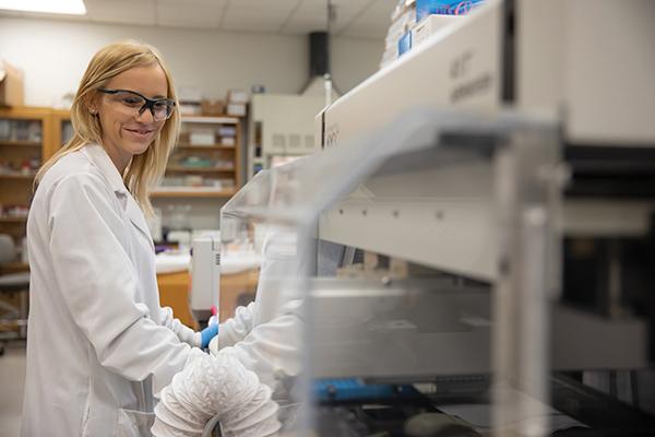 Woman performing an experiment