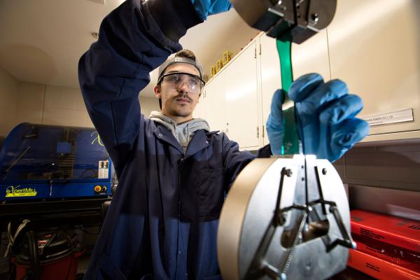 Student performing an engineering task