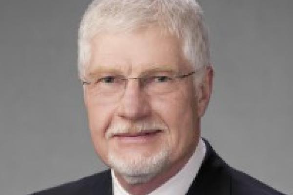 Larry E. Whaley.