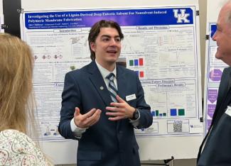 Jacob Childress presenting poster