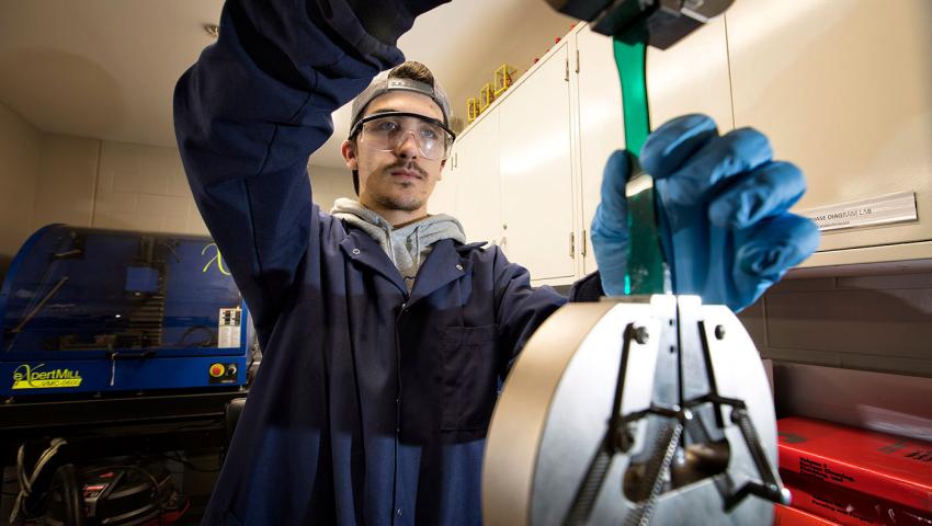 Student performing an engineering task