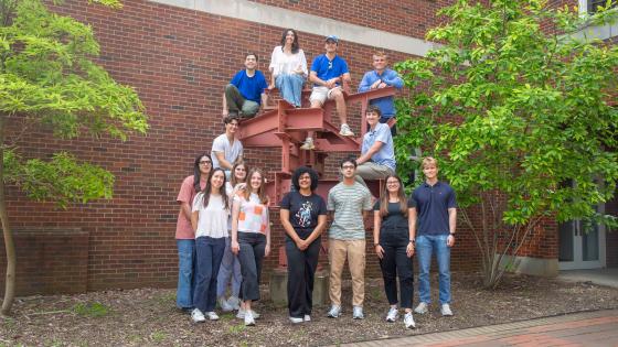 Group of students on a structure