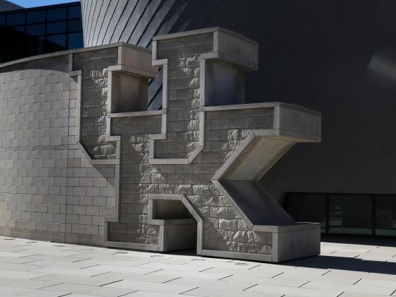 UK brick wall at the Gatton Student Center.