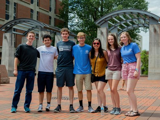 Group of freshman students standing near the arches in the Engineering courtyard.