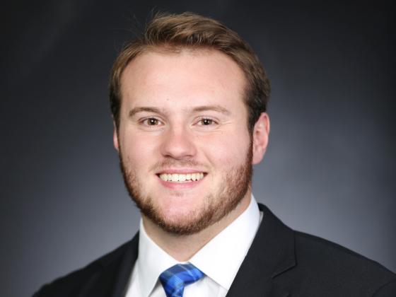 Professional headshot of Luke Fortner.