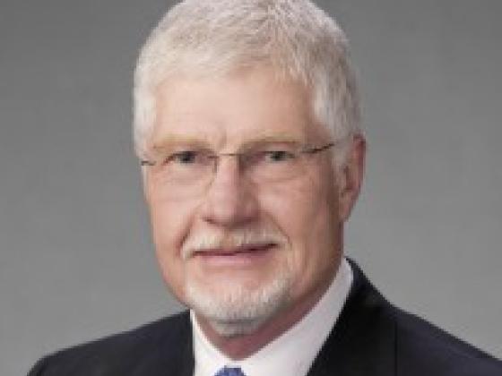 Larry E. Whaley.