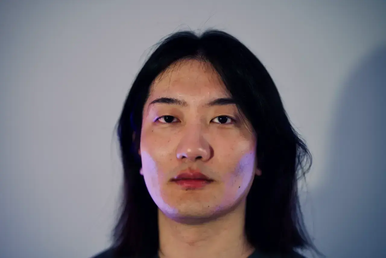 Shixiong Qi.